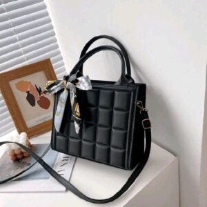 drafted  black  leather  hand bag